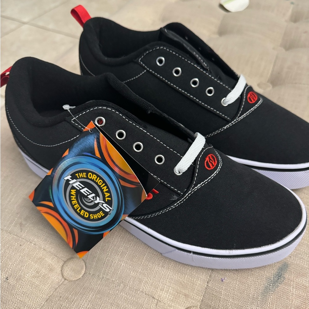 Heely’s men’s roller shoes. Size 12. NEVER WORN BRAND NEW
